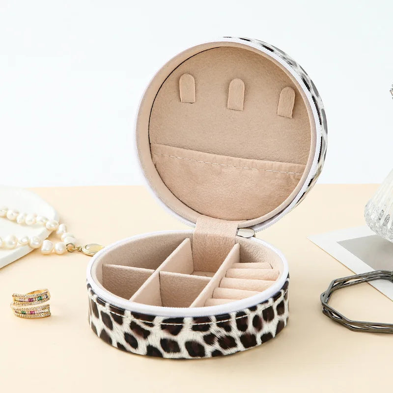 Boîte à bijoux en cuir rigide de poche