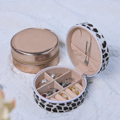 Boîte à bijoux en cuir rigide de poche