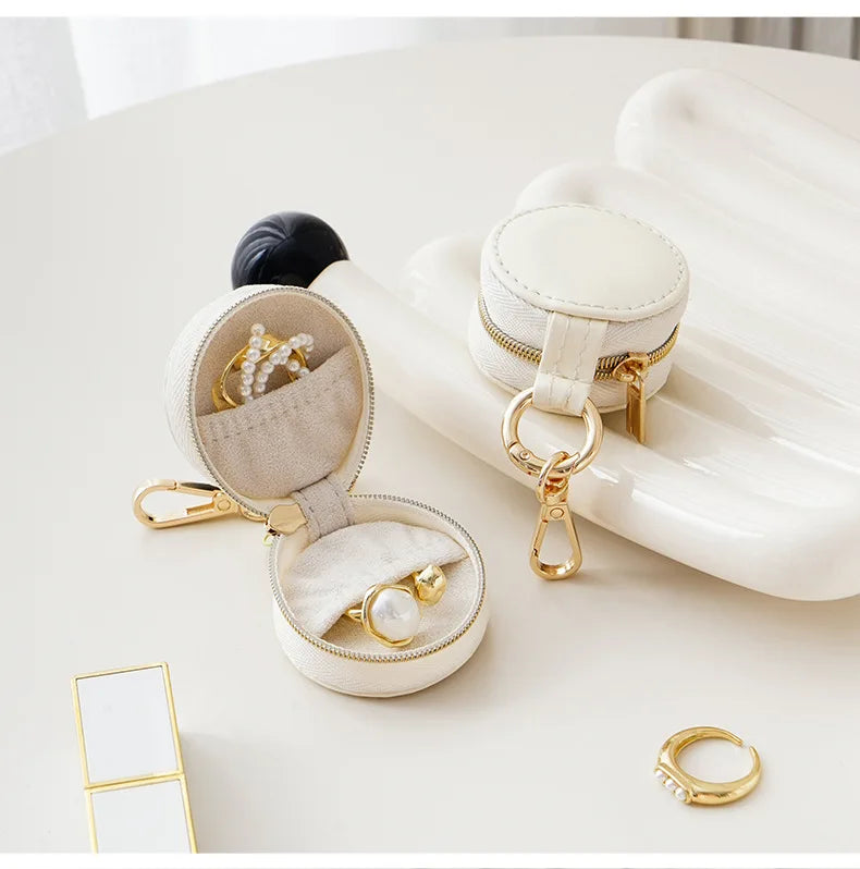 Boîte à bijoux de poche en porte-clé