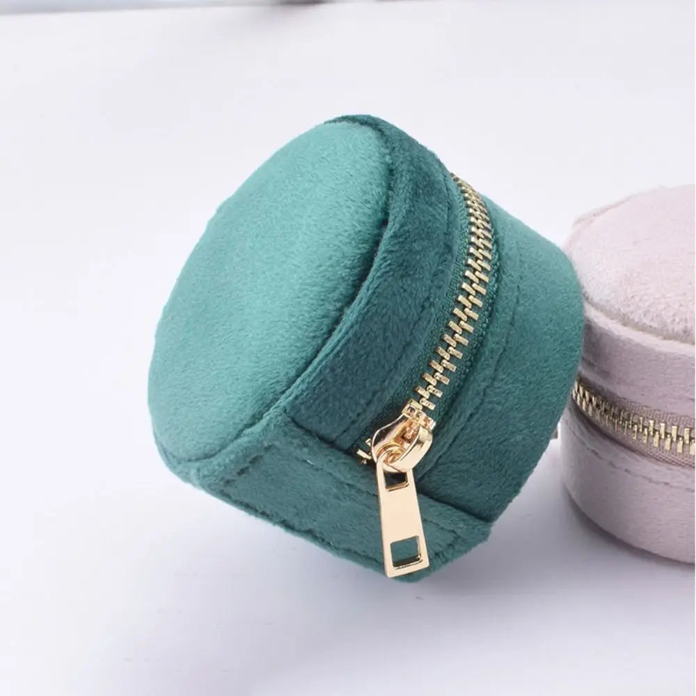 Boîte à bijoux de poche ronde en velours
