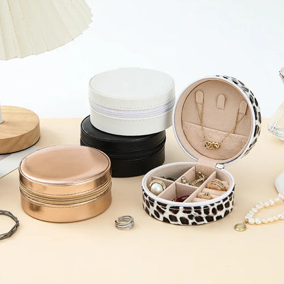 Boîte à bijoux en cuir rigide de poche